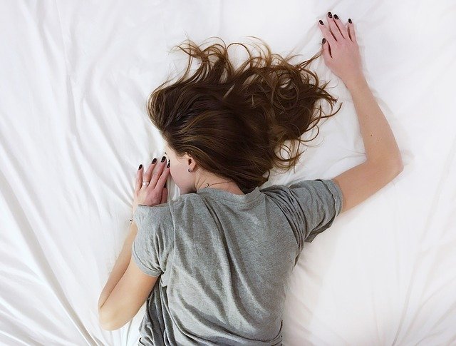 Best Sleep Positions for Back Pain, Acid Reflux, and Snoring
